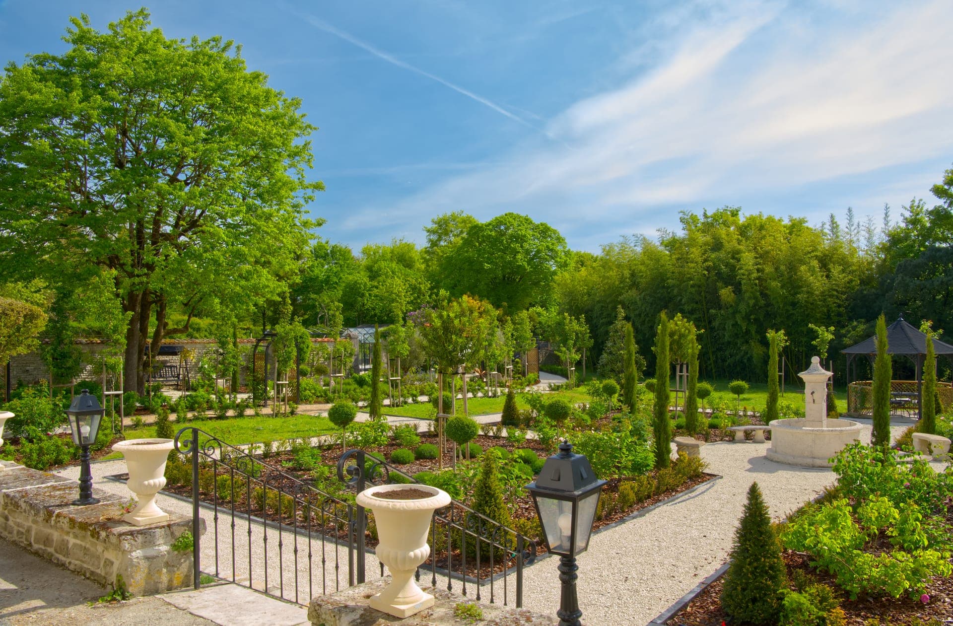Château Lesvescault — aerial view of the French gardens and estate, Villefagnan
