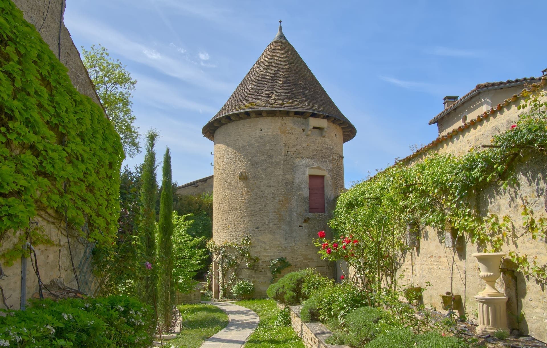Château Lesvescault - round tower and rose garden, Villefagnan, Charente