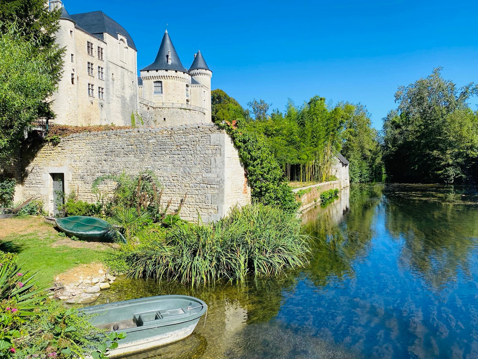 Château de Verteuil reflected in the river — one of the finest medieval châteaux in the Charente