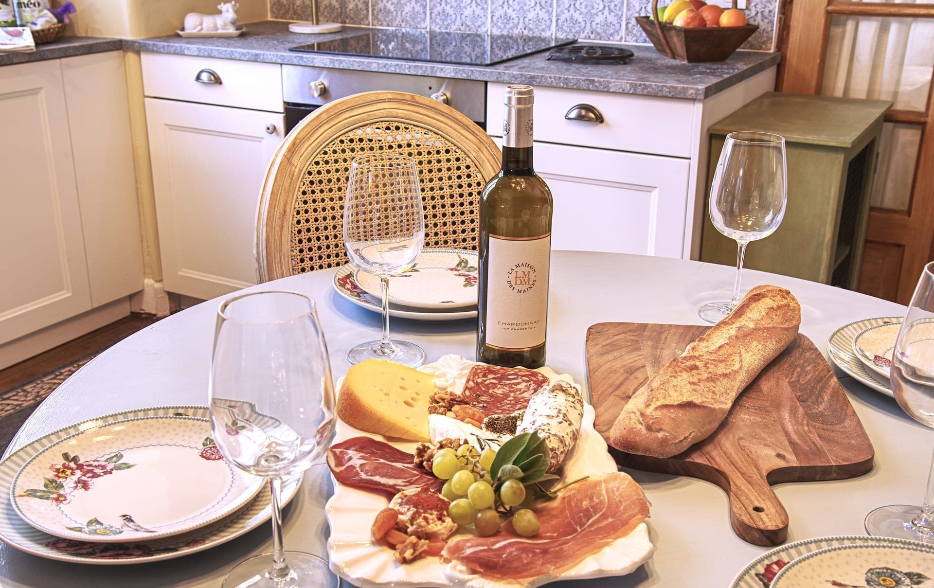 Maison Juliette — kitchen with local wine and cheese welcome